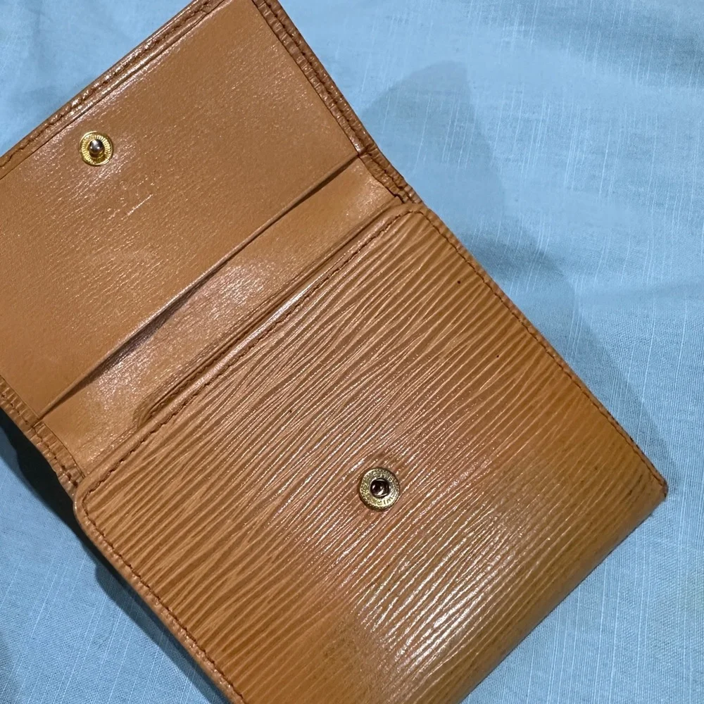 AUTHENTIC Louis Vuitton wallet. Tassel yellow.